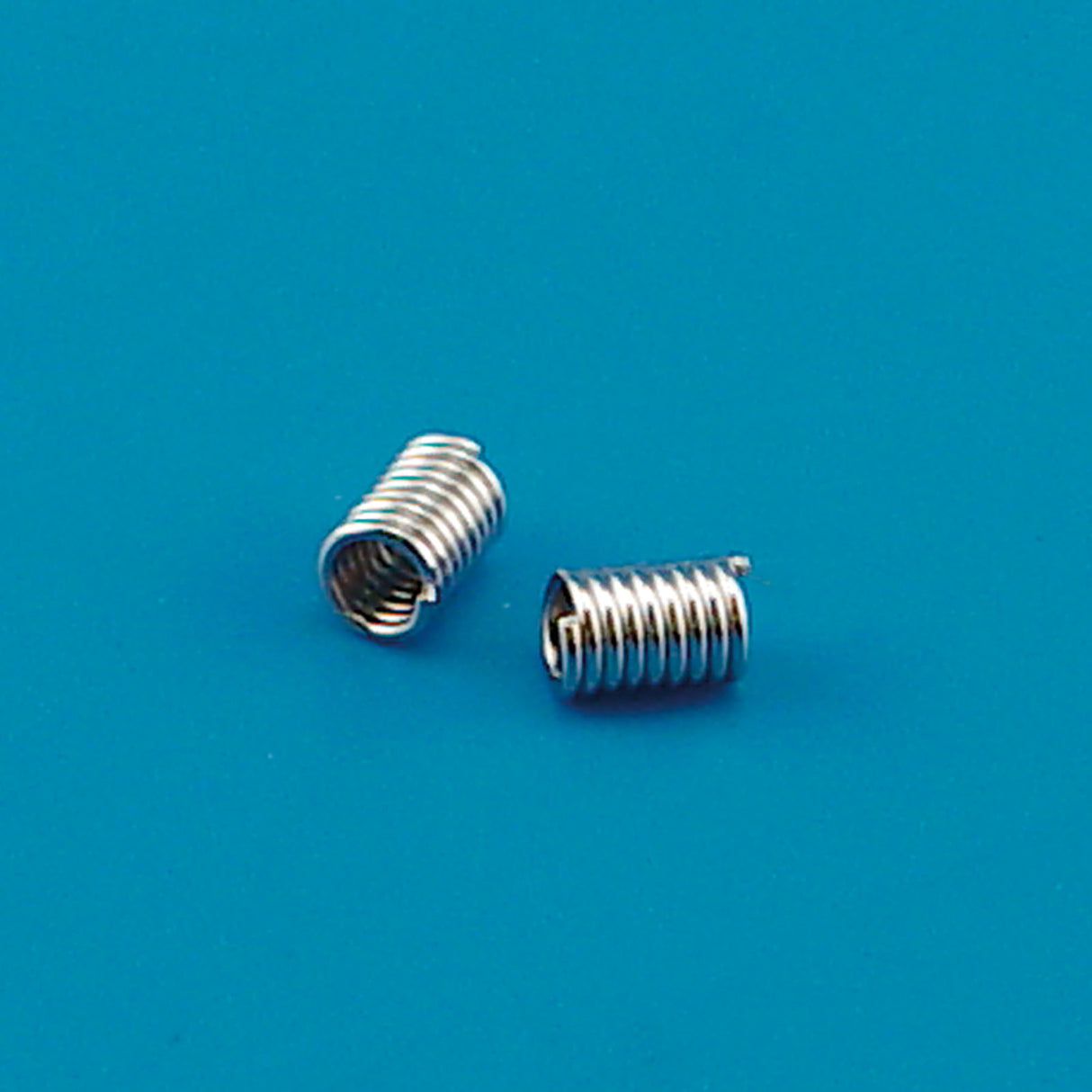Darice • spole spacer 18stk 5x8mm sølv