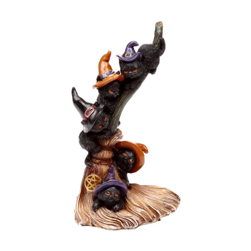 Hekse sort kat klatrende kosteskaft