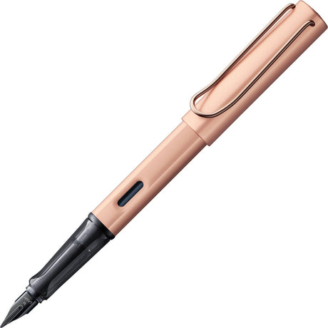 Lamy lx fyldepen 076 - lavet af letvægtsaluminium i farven rosaguld - med ædelmetalfinish og sort blank PVD stålspids, inkl. T10 blå blækpatron og luksuriøs gaveemballage