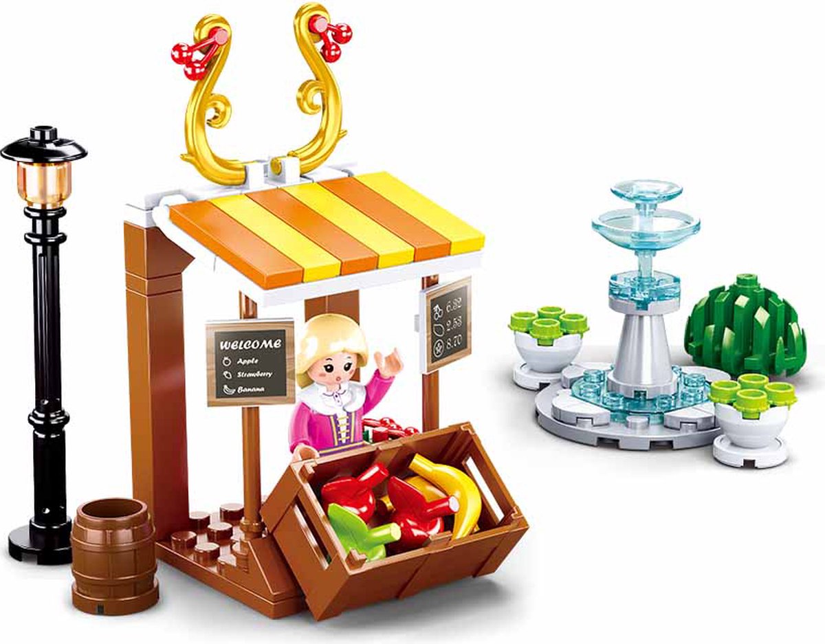 Sluban-pigers drømmelandsby frugtbod med springvandsbyggelegetøj til børn fra 6 år – byggelegetøj modelbyggemarkedsbod – byggeboks med 99 byggeklodser og 1 minifigur – m38-b0870