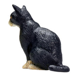 Mojo landbrugsjord siddende kat sort og hvid - 387371