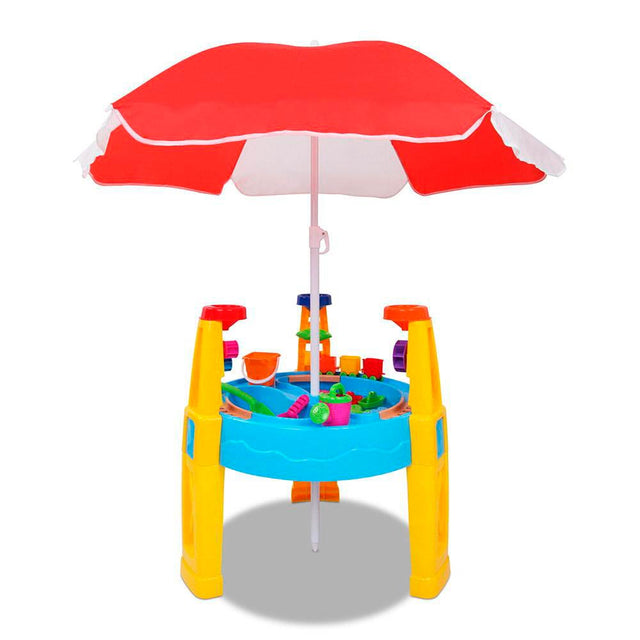 sandet vand legeplads med parasol