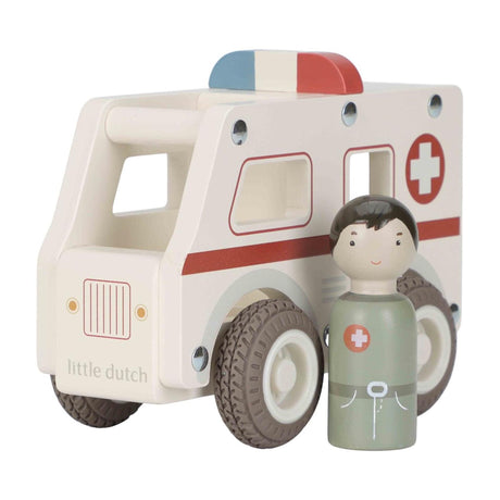 Lille hollandsk ambulancelegetøjsbil i træ med træfigur.