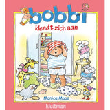 Kluitman Bobbi er ved at klæde sig på