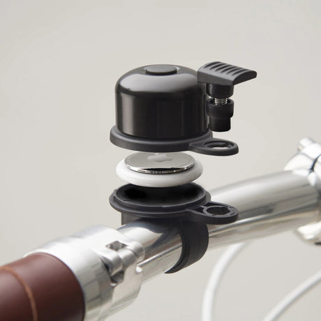 Airbell Bicycle Bell med Airtag Holder Ø31.8mm sort