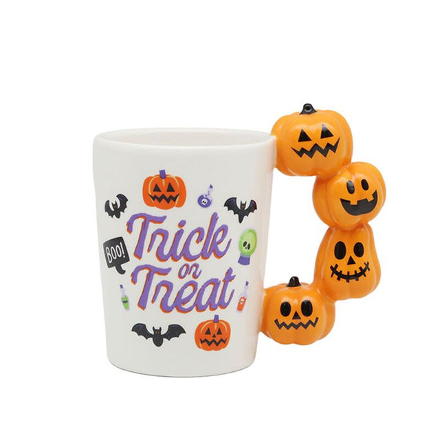 Uhyggeligt trick or treat græskarformet håndtagskrus