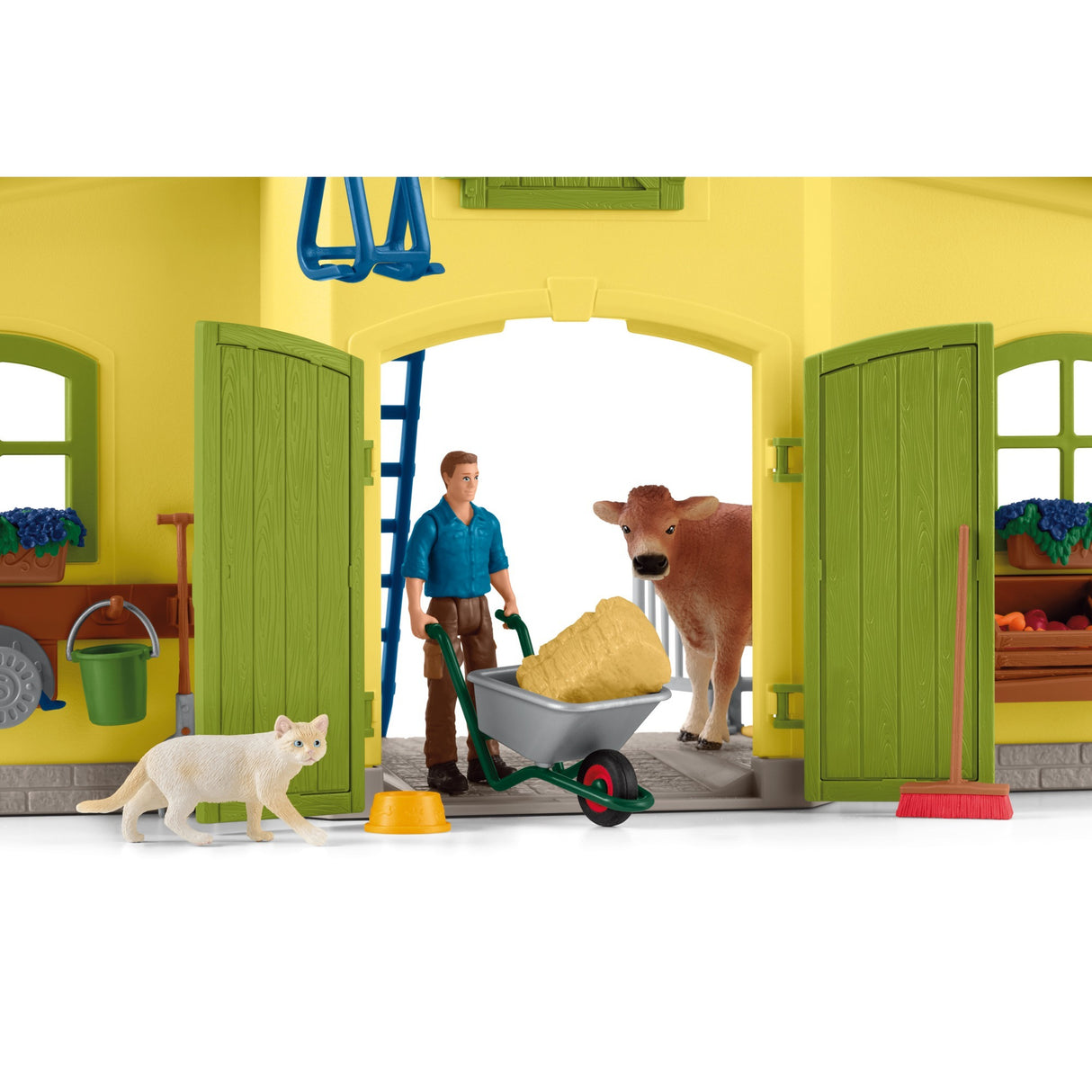 Schleich gårdverden - stor stald, gul spillefigur