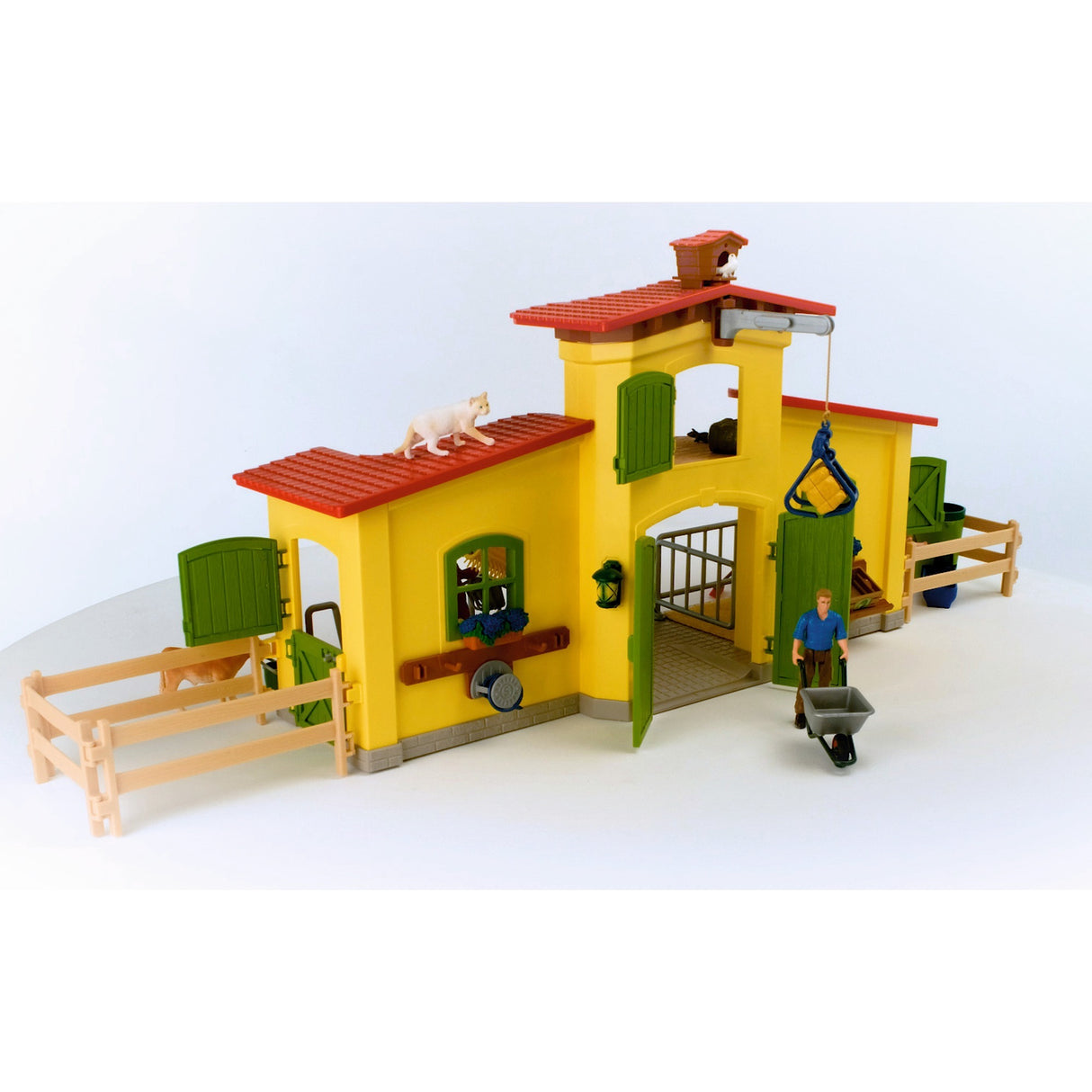 Schleich gårdverden - stor stald, gul spillefigur