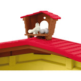Schleich gårdverden - stor stald, gul spillefigur