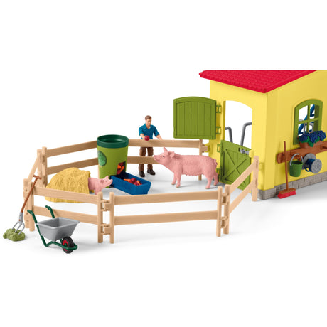 Schleich gårdverden - stor stald, gul spillefigur