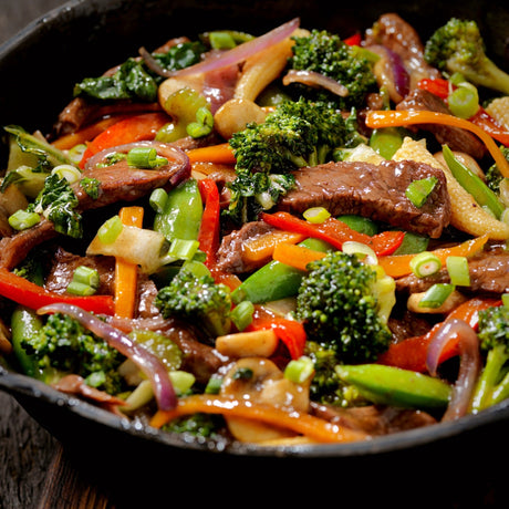 Kamado Joe® kulstofstål wok – til autentisk stegning på Kamado BBQ