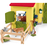 Schleich gårdverden - stor stald, gul spillefigur